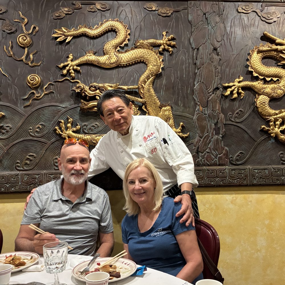 Chef Chu's - Chef Chu himself in front of the large 9-dragon panel. - Chinese Near Me - Los Altos, California