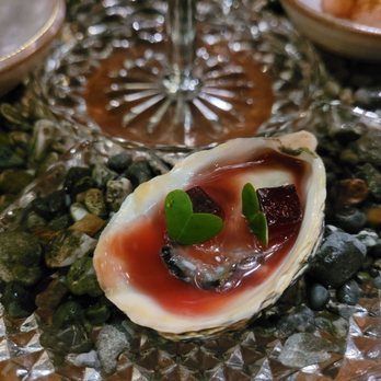 Lazy Bear - Oyster in the seafood tower, heavily garnished - New American Near Me - San Francisco, California