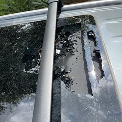 Texas Master Auto Glass - Shattered Moonroof from fallen tree branch during thunderstorm.