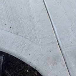 Cracked driveway after a few weeks of being poured.