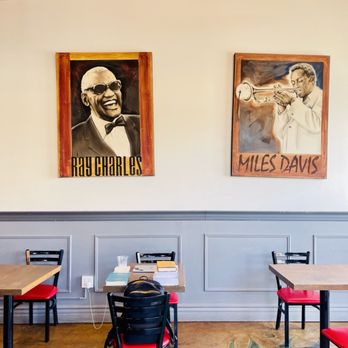 Ryan Bros Coffee - Beautiful indoor seating area with Legends on the wall - Coffee & Tea Near Me - San Marcos, California Ryan Bros Coffee - Beautiful indoor seating area with Legends on the wall - Coffee & Tea Near Me - San Marcos, California