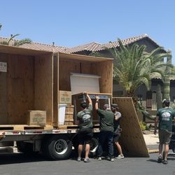 Jones Moving & Storage - Loading vaults on job site