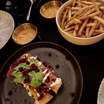 Movida - Pomegranate Adobo Chicken Taquitos and Movida Fries - Persian/Iranian Near Me - San Francisco, California Movida - Pomegranate Adobo Chicken Taquitos and Movida Fries - Persian/Iranian Near Me - San Francisco, California