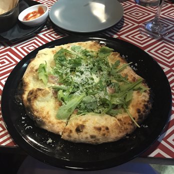 7th & Carson - Prosciutto Pizza, arugula, cheese, sunny side up egg. - New American Near Me - Las Vegas, Nevada 7th & Carson - Prosciutto Pizza, arugula, cheese, sunny side up egg. - New American Near Me - Las Vegas, Nevada