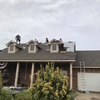 Southern Construction Services - two men on the roof of a house - Roofing Near Me - Trenton, Texas