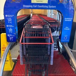 Sanitizing carts as you take one