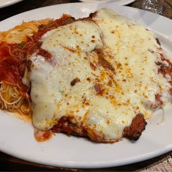 Butera's - Veal Parmesan with angel hair pasta. - Italian Near Me - Woodbury, New York Butera's - Veal Parmesan with angel hair pasta. - Italian Near Me - Woodbury, New York
