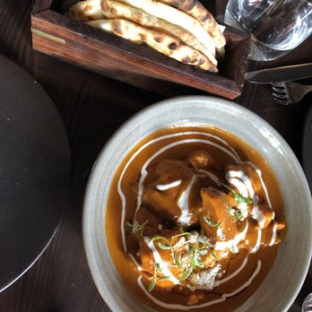 ROOH - Butter chicken and cheese naan. Cheese naan was like a cheddar quesadilla. I'd recommend garlic naan next time. - Indian Near Me - San Francisco, California