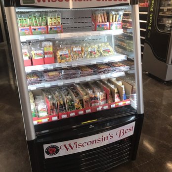 Family Mart - Curtin - a display of cheeses - Gas Stations Near Me - Curtin, Oregon