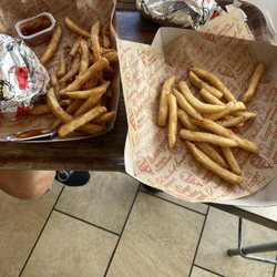 KFC - The fries on the left or the cold ones that they served us we had to ask for new ones and we only got about 15 new fries on the right