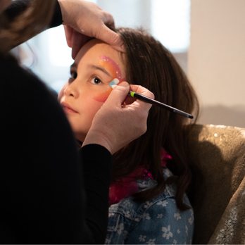 Godoy Events - Everyone loved getting their face (or arms) painted with fun, colorful designs. - Wedding Planning Near Me Godoy Events - Everyone loved getting their face (or arms) painted with fun, colorful designs. - Wedding Planning Near Me