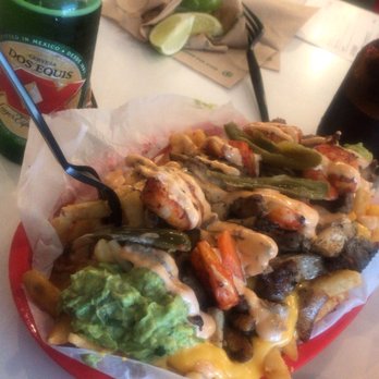 The Taco Stand - Mar y Tierra Fries with chicken instead of steak. - Mexican Near Me - Miami, Florida The Taco Stand - Mar y Tierra Fries with chicken instead of steak. - Mexican Near Me - Miami, Florida