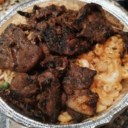 Roasted lamb w/ jerk mac and rice