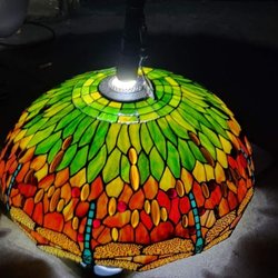 Cushman - Tiffany style  dragonfly lamp  approximately 23 in.  across center and approximately 12-14 in. tall. Unique turquoise body  on dragonfly