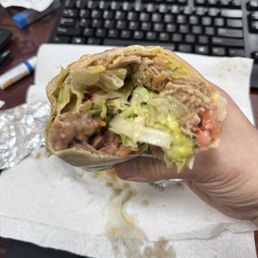 ¡Que la chingada! Very little meat & mostly filler in their "Jumbo" carnitas burrito. ¡Que la chingada! Very little meat & mostly filler in their "Jumbo" carnitas burrito.