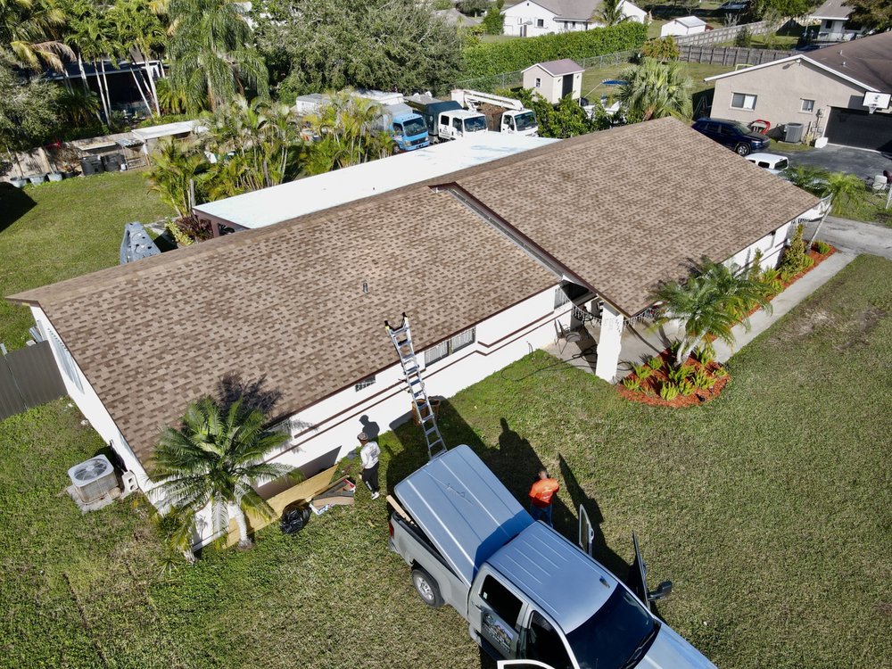 Slide of TJ Platinum Roofing