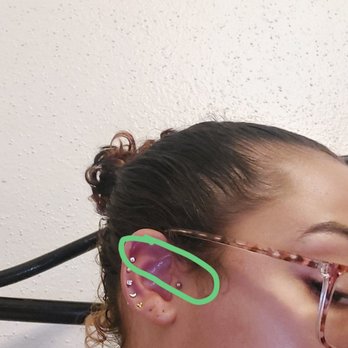 Platinum Ink - Two that I got pierced (Tragus and was told Helix for the upper one) - Tattoo Near Me - Austin, Texas