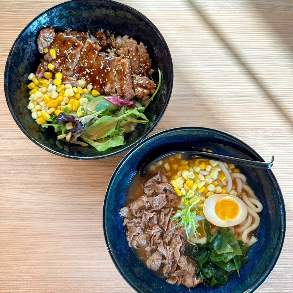 Feng Donburi - two bowls of food on a table - Japanese Near Me - Edmonton, Alberta Feng Donburi - two bowls of food on a table - Japanese Near Me - Edmonton, Alberta