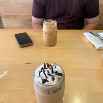 Rooster - Downtown - Iced Chocolate Bar Latte and a Sallie Cinnamon Iced Latte. - Creperies Near Me - St. Louis, Missouri