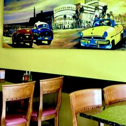 Mirna's Cuban Cuisine - Inside decor tiny place maybe 8 tables