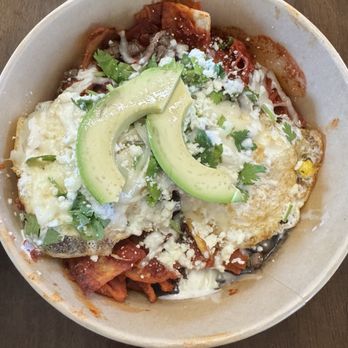 Chilaqueria Monarca - Red chilaquiles with added arrachera/steak, and eggs. - Mexican Near Me - El Paso, Texas Chilaqueria Monarca - Red chilaquiles with added arrachera/steak, and eggs. - Mexican Near Me - El Paso, Texas
