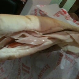 a sub sandwich with meat and cheese a sub sandwich with meat and cheese