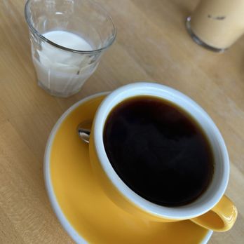 WeBe Coffee Roasters - Guatemalan drip coffee with a little half and half ots - Coffee Roasteries Near Me - Phoenix, Arizona