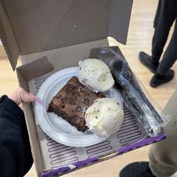 Insomnia Cookies - 2 scoops of cookies and cream Ice Cream on a Brownie