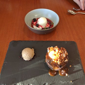 The Conservatory - Now this is how you do a good dessert! I highly recommended it - Pavlova and Chocolate Ricotta Cheesecake - New American Near Me - Half Moon Bay, California The Conservatory - Now this is how you do a good dessert! I highly recommended it - Pavlova and Chocolate Ricotta Cheesecake - New American Near Me - Half Moon Bay, California