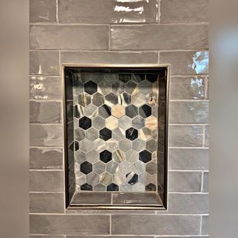 TruCon Construction - a bathroom shower with a mosaic tile wall - General Contractors Near Me - Murfreesboro, Tennessee TruCon Construction - a bathroom shower with a mosaic tile wall - General Contractors Near Me - Murfreesboro, Tennessee
