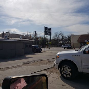 Southtown 101 - a white pickup truck parked on the side of the road - Wine Bars Near Me - San Antonio, Texas
