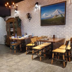 Ararat - There are 8 tables in the dining room and 4 more out on front patio.