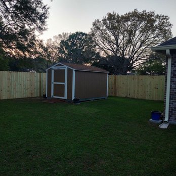 SMC Maintenance - a backyard with a shed and fence - Fences & Gates Near Me SMC Maintenance - a backyard with a shed and fence - Fences & Gates Near Me