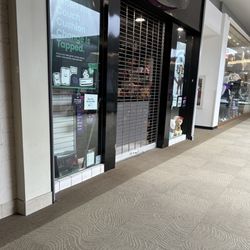 Gamestop - This is an hour after the store was supposed to be open