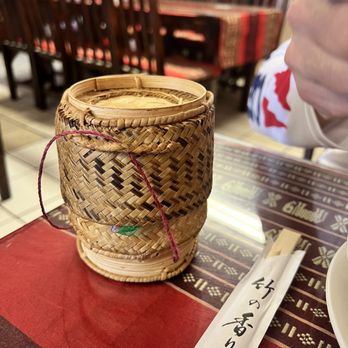 New Spicy House - a bowl of soup and a knife on a table - Thai Near Me - Waianae, Hawaii