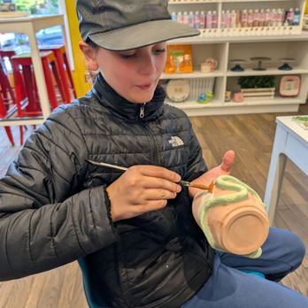 Cerami Cafe - Painting a snake cup. - Paint-Your-Own Pottery Near Me - Lake Oswego, Oregon Cerami Cafe - Painting a snake cup. - Paint-Your-Own Pottery Near Me - Lake Oswego, Oregon