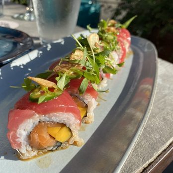 Wabi on Rose - Salmon roll with mango covered in fried garlic. Favorite roll of the night. Delicious. - Sushi Bars Near Me - Venice, California Wabi on Rose - Salmon roll with mango covered in fried garlic. Favorite roll of the night. Delicious. - Sushi Bars Near Me - Venice, California