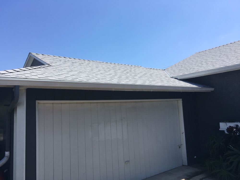 Slide of Yoshida Roofing Company