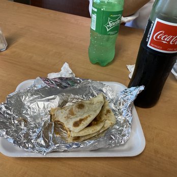 Texas Tacos - a bottle of coke and a plate of tortillas - Tacos Near Me - Houston, Texas Texas Tacos - a bottle of coke and a plate of tortillas - Tacos Near Me - Houston, Texas