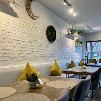 Sweet Moon - a dining area with white brick walls - Bakeries Near Me - Chicago, Illinois Sweet Moon - a dining area with white brick walls - Bakeries Near Me - Chicago, Illinois