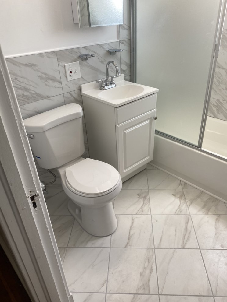 Slide of T Power House Building & Remodeling