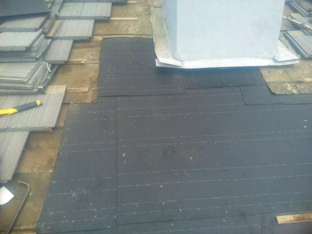 Slide of Earl Bennett Roofing