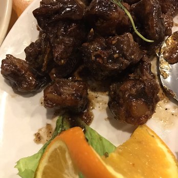 Thai BBQ - Garlic short ribs that are pork pieces fried super crisp - Thai Near Me - Union City, California Thai BBQ - Garlic short ribs that are pork pieces fried super crisp - Thai Near Me - Union City, California