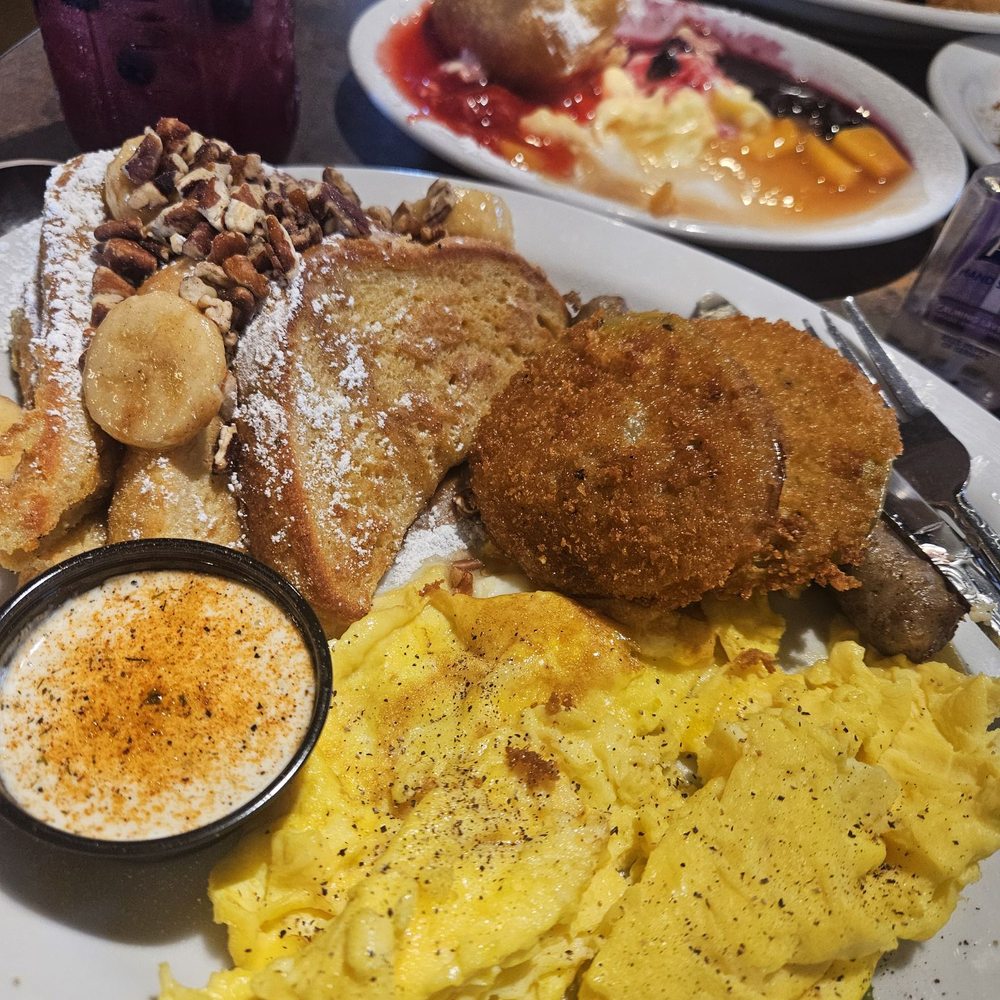 Huckleberry's - Banana Foster Platter with scrambled eggs - Breakfast & Brunch Near Me - Arlington, Texas Huckleberry's - Banana Foster Platter with scrambled eggs - Breakfast & Brunch Near Me - Arlington, Texas