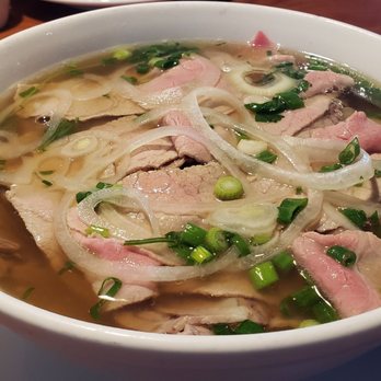 Pho 79 Noodles & Grill - Pho with rare round steak, brisket and tendon...very bland unfortunately - Vietnamese Near Me - Virginia Beach, Virginia Pho 79 Noodles & Grill - Pho with rare round steak, brisket and tendon...very bland unfortunately - Vietnamese Near Me - Virginia Beach, Virginia