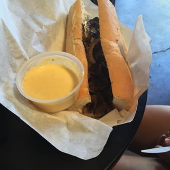 Kaya's Kitchen - Philly cheese steak with hot sauce on the side - Food Trucks Near Me Kaya's Kitchen - Philly cheese steak with hot sauce on the side - Food Trucks Near Me