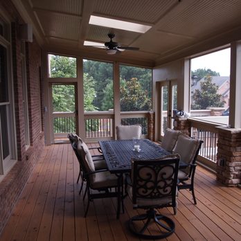 Inside Out Space Concepts - a patio with a table and chairs - General Contractors Near Me Inside Out Space Concepts - a patio with a table and chairs - General Contractors Near Me