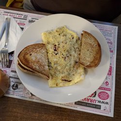 Pinky's Family Restaurant - Meat lovers omelet, 3 eggs and rye toast.