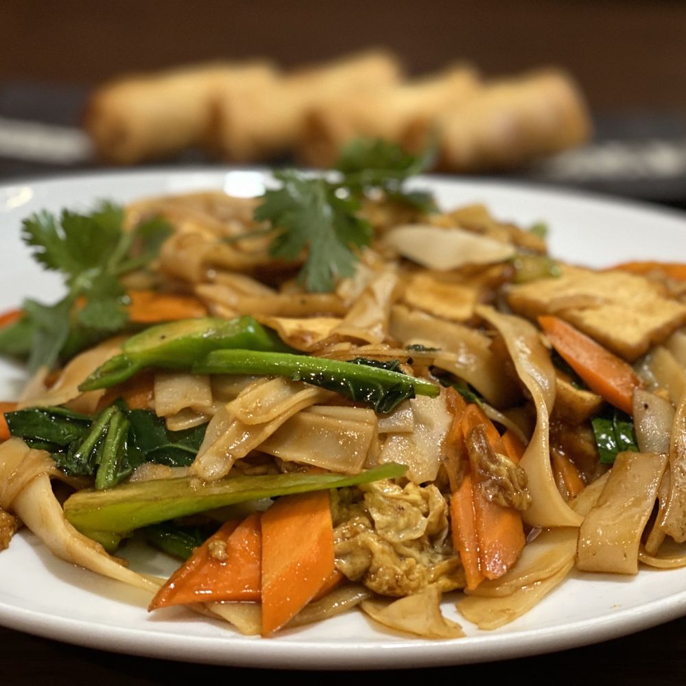 Pho Thai - Pad see we with tofu and veggie spring rolls. Yum. - Vietnamese Near Me - Sioux Falls, South Dakota Pho Thai - Pad see we with tofu and veggie spring rolls. Yum. - Vietnamese Near Me - Sioux Falls, South Dakota