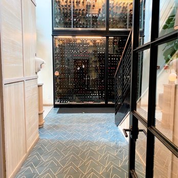 Amara at Paraiso - Wine cage from restroom entrance - Latin American Near Me - Miami, Florida Amara at Paraiso - Wine cage from restroom entrance - Latin American Near Me - Miami, Florida